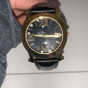 Black and gold watch for style